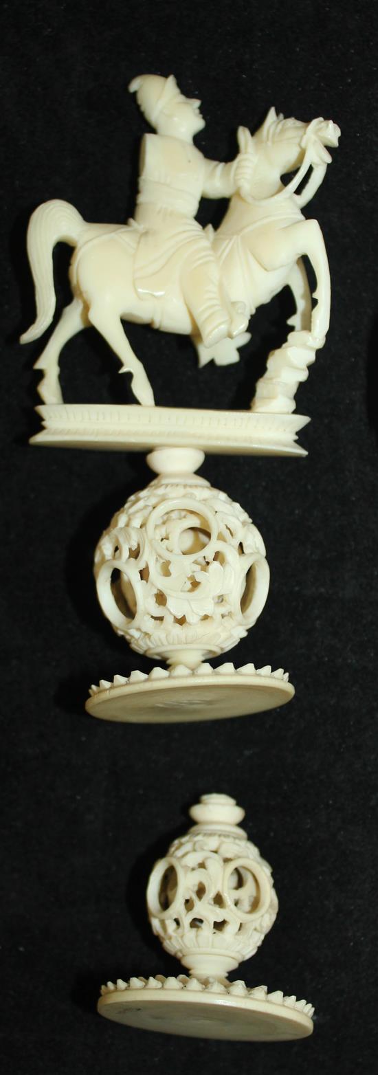 A Chinese export ivory puzzle ball and stand and four similar ivory chess pieces, 19th / early 20th century, 6.5cm - 21cm